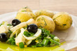 Foto: green salad with onion and squid green salad with onion and squid