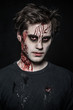 a scary and bloody zombie man