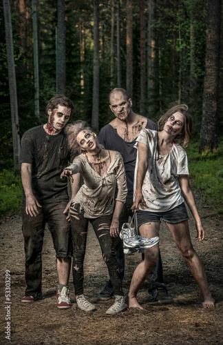 Photo: scary bloody zombies waiting for a prey scary bloody zombies waiting for a prey