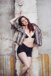 fashion model wearing a fur west