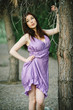 fashion brunette posing outdoors