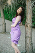 fashion brunette posing outdoors