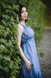 fashion brunette posing outdoors