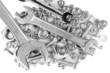 Wrenches on bolts, screws and nuts isolated on white