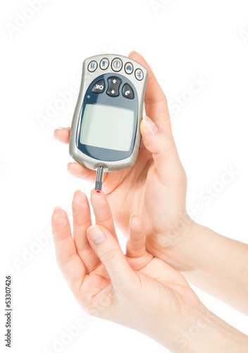 Photo: Diabetic patient measuring glucose level blood test Diabetic patient measuring glucose level blood test