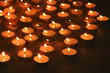Burning candles on dark background