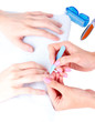Man doing manicure in salon