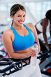 Foto: Gym woman with a bottle of water Gym woman with a bottle of water