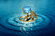 Jewelry ring in water waves