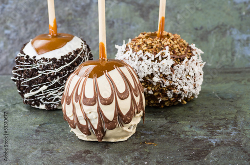 Photo: Chocolate or caramel covered apples Chocolate or caramel covered apples