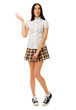 Modest girl in plaid skirt