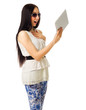 Young girl talks by tablet PC
