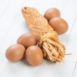Photo: Dairy products: smoked braided cheese and brown chicken eggs Dairy products: smoked braided cheese and brown chicken eggs