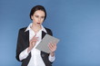 woman holding digital tablet