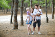 Family of four at summer day