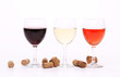Three wine glasses and corks.