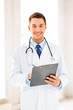 male doctor writing prescription