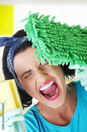 Photo: Tired and exhausted cleaning woman Tired and exhausted cleaning woman