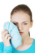 Woman having a terrible tooth ache.