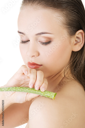 Photo: Woman with aloe vera Woman with aloe vera