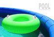 Inflatable pool with floating lifebuoy.