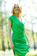 Photo: Happy woman in park Happy woman in park