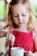 Photo: Little girl drinking hot chocolate Little girl drinking hot chocolate