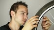 Man repairing bicycle