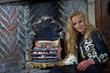 Photo: Woman sitting with a dog puppy in luxury interior Woman sitting with a dog puppy in luxury interior