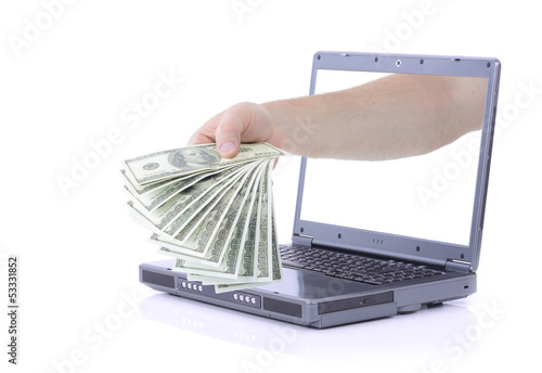 Photo: laptop money laptop money