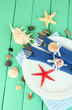 Marine table setting on color wooden background