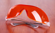 Glasses scientist on wooden background