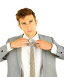 Portrait of young businessman, isolated on white