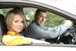 Photo: Portrait of young beautiful couple sitting in the car Portrait of young beautiful couple sitting in the car