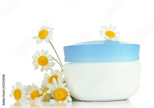 Photo: Cosmetic cream with wild camomiles, isolated on white Cosmetic cream with wild camomiles, isolated on white