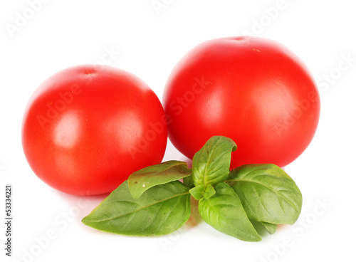 Photo: Tomato and basil isolated on white Tomato and basil isolated on white