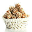 Tasty peanuts with sesame and caramel, isolated on white