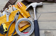 tool belt stuffed with various tools