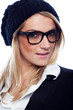 Foto: Beautiful woman in a beret and glasses Beautiful woman in a beret and glasses