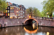 Canal Bridge in Amsterdam at Evening