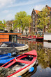 Boats on Canal in Amsterdam