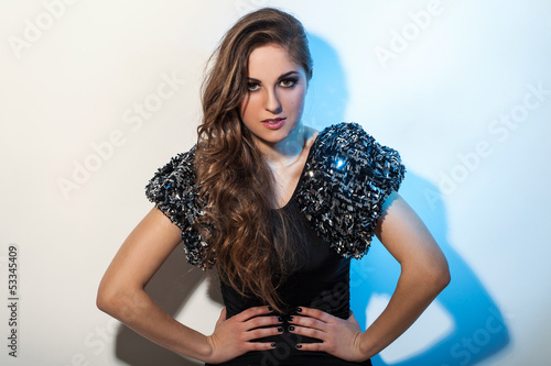 Photo: Beautiful young woman with luxury style Beautiful young woman with luxury style