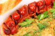 grilled sausage with garnish on the plate.