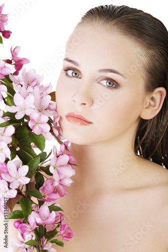 Photo: Beautiful face of spa woman with healthy clean skin. Beautiful face of spa woman with healthy clean skin.