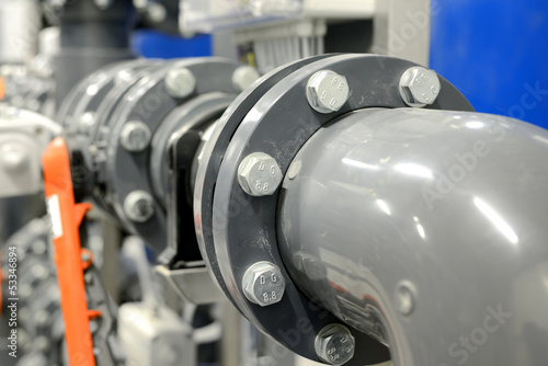 Photo: new plastic pipes in industrial boiler room new plastic pipes in industrial boiler room