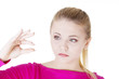 Woman showing something small