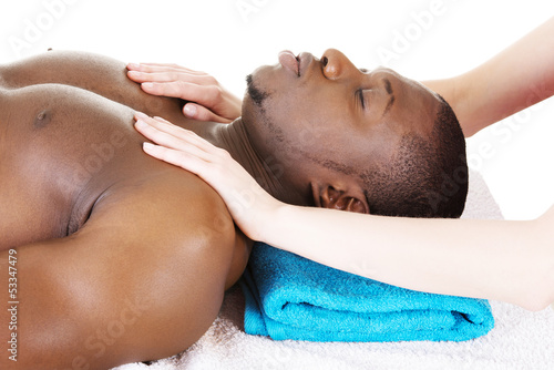Photo: Man receiving massage Man receiving massage