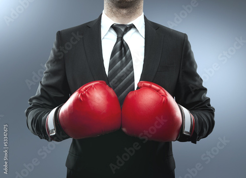 Photo: man in boxing gloves man in boxing gloves