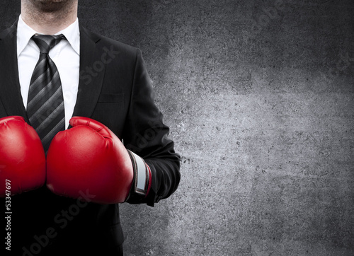 Photo: man in boxing gloves man in boxing gloves