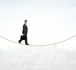 Photo: man walking on a rope man walking on a rope